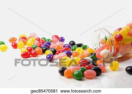 Close-up of jellybeans spilt out of a jar View Large Photo Image Stock Image - Close-up of jellybeans spilt out of a jar. Fotosearch