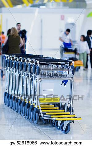 Close-up of luggage carts at an airport, Madrid, Spain View Large Photo Image Stock Photograph - Close-up of luggage carts at an airport, Madrid, Spain. Fotosearch