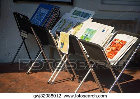 Close-up of paintings on chairs View Large Photo Image Stock Image - Close-up of paintings on chairs. Fotosearch