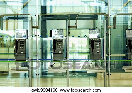 Close-up of payphones at an airport, Madrid, Spain View Large Photo Image Stock Photograph - Close-up of payphones at an airport, Madrid, Spain. Fotosearch