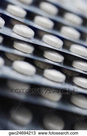 Close-up of pills in blister packs View Large Photo Image Stock Image - Close-up of pills in blister packs. Fotosearch