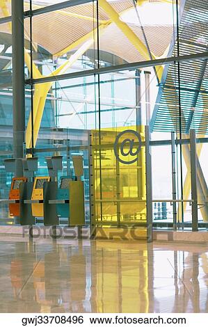 Close-up of public internet access points at an airport, Madrid, Spain View Large Photo Image Stock Photograph - Close-up of public internet access points at an airport, Madrid, Spain. Fotosearch