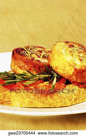 Close-up of slices of roast meat with bread on a plate View Large Photo Image Picture - Close-up of slices of roast meat with bread on a plate. Fotosearch