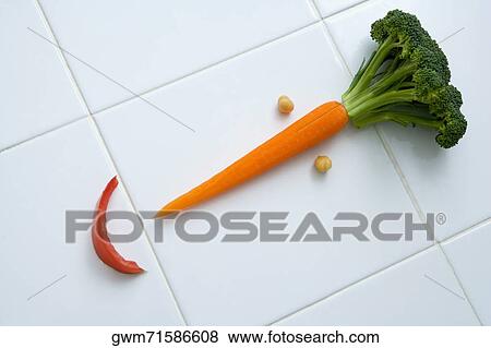 Close-up of smiley face made up of vegetables View Large Photo Image Stock Photo - Close-up of smiley face made up of vegetables. Fotosearch