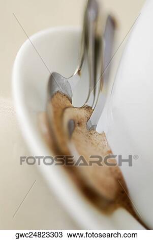 Close-up of spoons on a saucer View Large Photo Image Stock Image - Close-up of spoons on a saucer. Fotosearch
