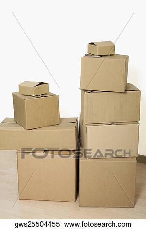 Close-up of stacks of cardboard boxes View Large Photo Image Stock Photography - Close-up of stacks of cardboard boxes. Fotosearch