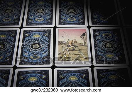 Close-up of tarot cards in a row View Large Photo Image Stock Image - Close-up of tarot cards in a row. Fotosearch