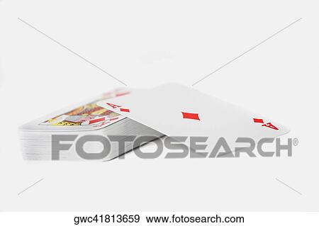 Close-up of the ace of diamonds on a stack of playing cards View Large Photo Image Stock Photo - Close-up of the ace of diamonds on a stack of playing cards. Fotosearch