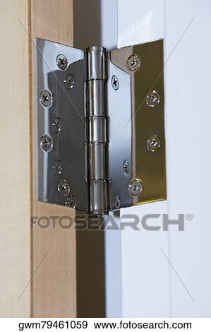 Close-up of the hinge on a door View Large Photo Image Stock Photo - Close-up of the hinge on a door. Fotosearch