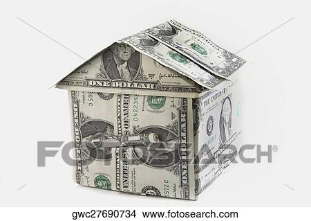 Picture - Close-up of the model of a house made of American dollar bills. Fotosearch