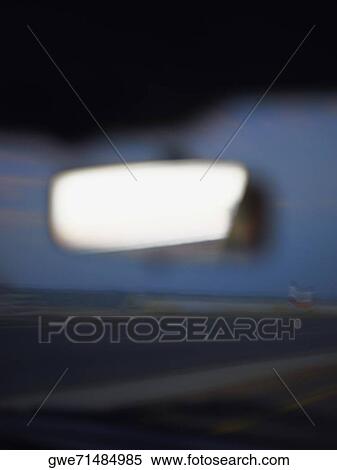 Close-up of the rear-view mirror of a car View Large Photo Image Stock Photography - Close-up of the rear-view mirror of a car. Fotosearch