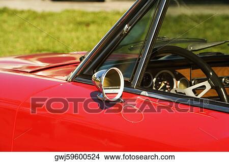 Close-up of the side view mirror of a car View Large Photo Image Picture - Close-up of the side view mirror of a car. Fotosearch