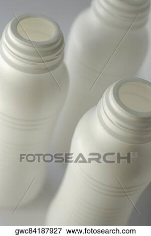 Close-up of three bottles View Large Photo Image Stock Photo - Close-up of three bottles. Fotosearch