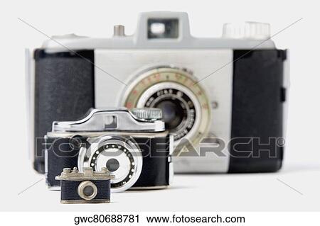 Close-up of three cameras View Large Photo Image Stock Image - Close-up of three cameras. Fotosearch