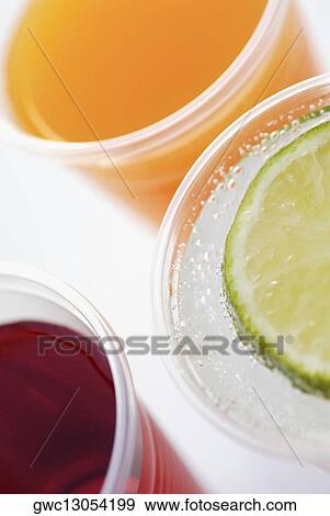 Close-up of three glasses View Large Photo Image Stock Photo - Close-up of three glasses. Fotosearch