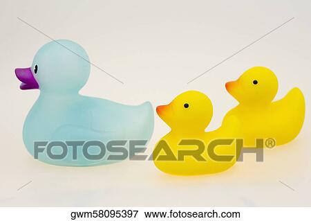 Close-up of three rubber ducks View Large Photo Image Stock Photo - Close-up of three rubber ducks. Fotosearch