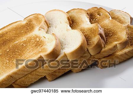Stock Photography - Close-up of toast in a plate. Fotosearch