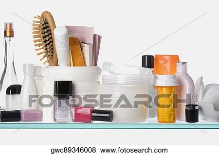 Close-up of toiletries on a shelf View Large Photo Image Stock Photo - Close-up of toiletries on a shelf. Fotosearch