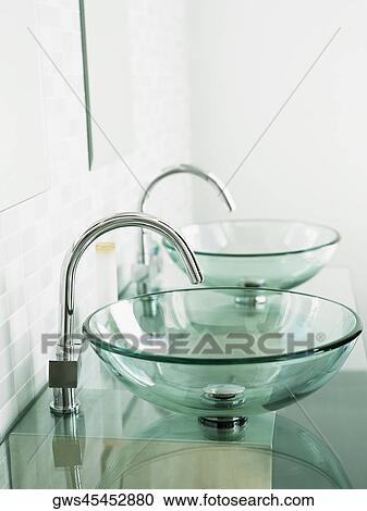 Close-up of two bathroom sinks View Large Photo Image Stock Image - Close-up of two bathroom sinks. Fotosearch