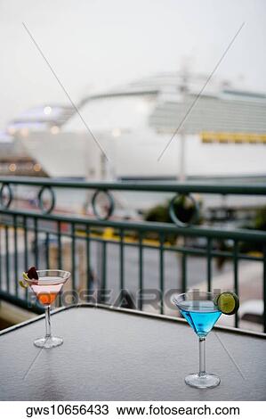 Stock Image - Close-up of two cocktails on the table. Fotosearch