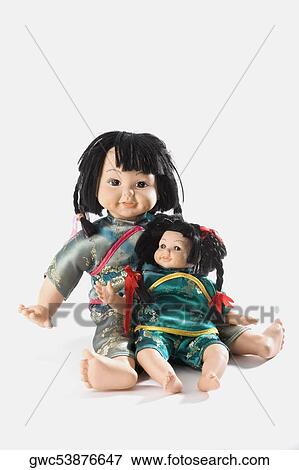 Close-up of two dolls View Large Photo Image Stock Photo - Close-up of two dolls. Fotosearch