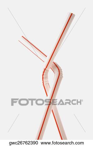 Stock Image - Close-up of two drinking straws. Fotosearch