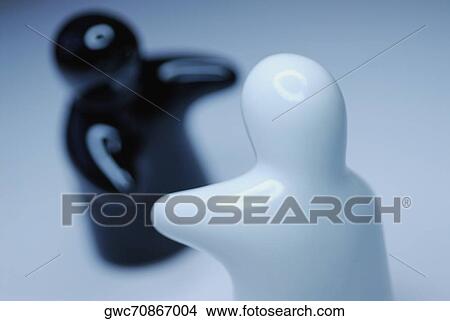 Close-up of two figurines View Large Photo Image Picture - Close-up of two figurines. Fotosearch