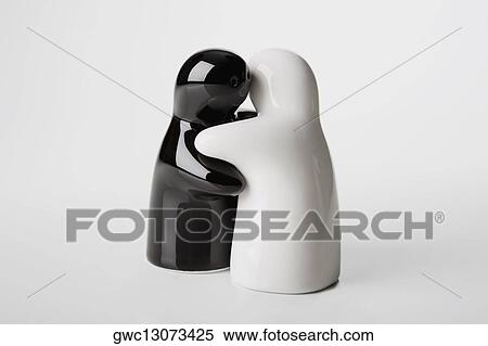 Close-up of two figurines View Large Photo Image Stock Photography - Close-up of two figurines. Fotosearch