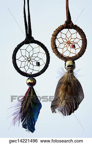 Close-up of two ornaments hanging View Large Photo Image Stock Photograph - Close-up of two ornaments hanging. Fotosearch