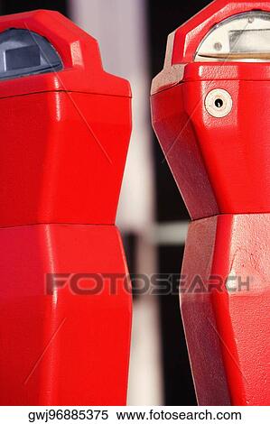 Close-up of two parking meters View Large Photo Image Stock Photography - Close-up of two parking meters. Fotosearch