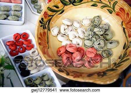 Close-up of uncooked dumplings in trays View Large Photo Image Stock Image - Close-up of uncooked dumplings in trays. Fotosearch