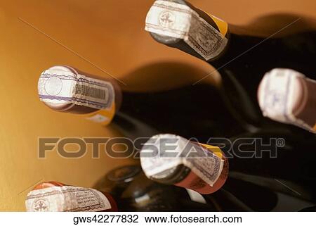 Close-up of wine bottles View Large Photo Image Stock Image - Close-up of wine bottles. Fotosearch