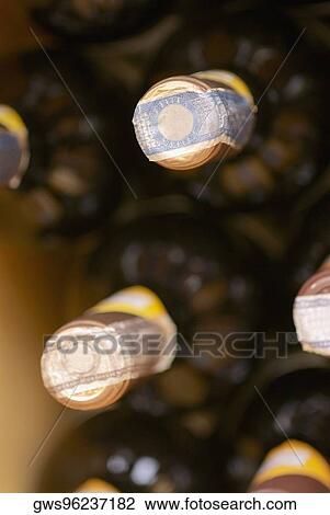 Close-up of wine bottles View Large Photo Image Stock Image - Close-up of wine bottles. Fotosearch