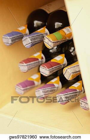 Close-up of wine bottles View Large Photo Image Stock Image - Close-up of wine bottles. Fotosearch