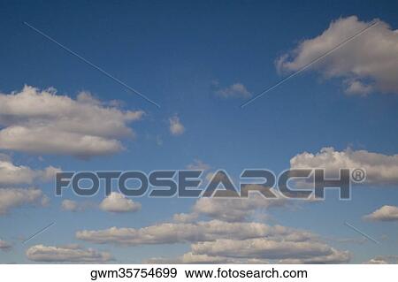 Stock Photo - Clouds in the sky. Fotosearch