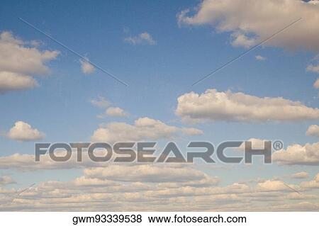 Stock Photo - Clouds in the sky. Fotosearch