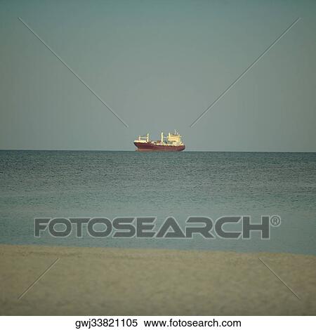 Container ship in the sea View Large Photo Image Stock Photography - Container ship in the sea. Fotosearch