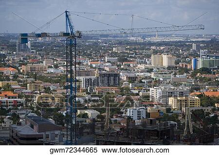 Crane at a construction site View Large Photo Image Stock Photography - Crane at a construction site. Fotosearch