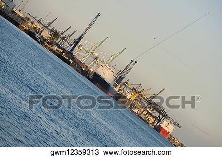 Cranes at a commercial dock View Large Photo Image Stock Image - Cranes at a commercial dock. Fotosearch