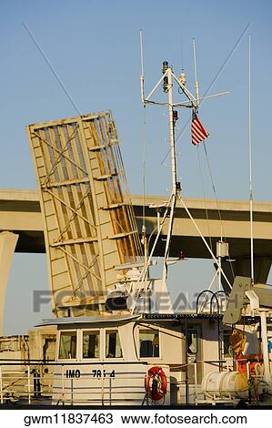 Stock Image - Cruise ship at a harbor. Fotosearch