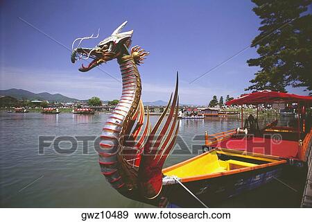 Dragon boat in a lake, Mifune Matsuri, Arashiyama, Kyoto Prefecture, Japan View Large Photo Image Stock Photo - Dragon boat in a lake, Mifune Matsuri, Arashiyama, Kyoto Prefecture, Japan. Fotosearch