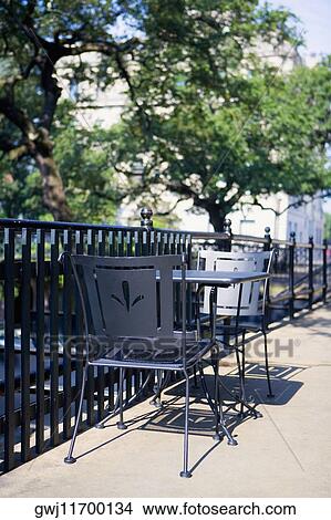 Empty table with two chairs, Savannah, Georgia, USA View Large Photo Image Picture - Empty table with two chairs, Savannah, Georgia, USA. Fotosearch