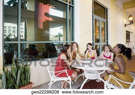 Five teenage girls sitting together and discussing View Large Photo Image Stock Photo - Five teenage girls sitting together and discussing. Fotosearch
