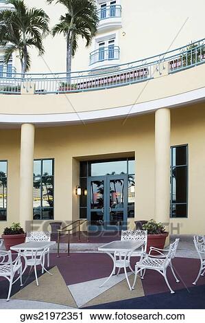 Stock Image - Furniture in the courtyard of a restaurant. Fotosearch