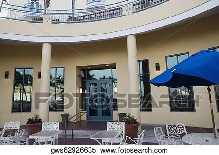 Furniture in the courtyard of a restaurant View Large Photo Image Stock Photography - Furniture in the courtyard of a restaurant. Fotosearch