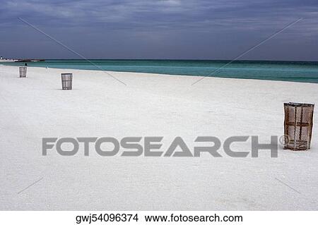 Picture - Garbage bins on the beach. Fotosearch
