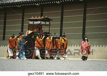 Group of people walking in a procession, Hollyhock festival, Kyoto Prefecture, Japan View Large Photo Image Stock Image - Group of people walking in a procession, Hollyhock festival, Kyoto Prefecture, Japan. Fotosearch
