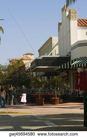 Group of people walking on the street View Large Photo Image Stock Image - Group of people walking on the street. Fotosearch