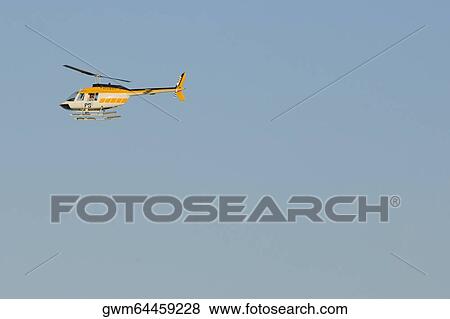 Stock Photo - Helicopter in flight. Fotosearch
