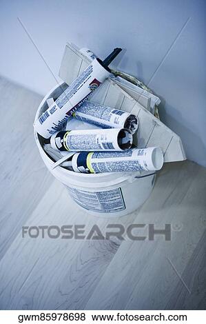 High angle view of a bucket of empty silicon guns View Large Photo Image Stock Photo - High angle view of a bucket of empty silicon guns. Fotosearch